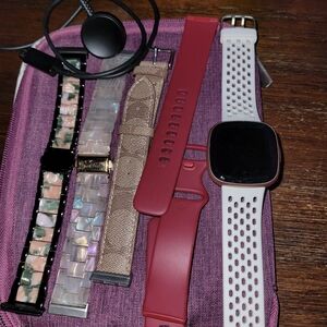 Fitbit Smartwatch  Versa 4 Rose Gold. With 4 Extra Bands And Case